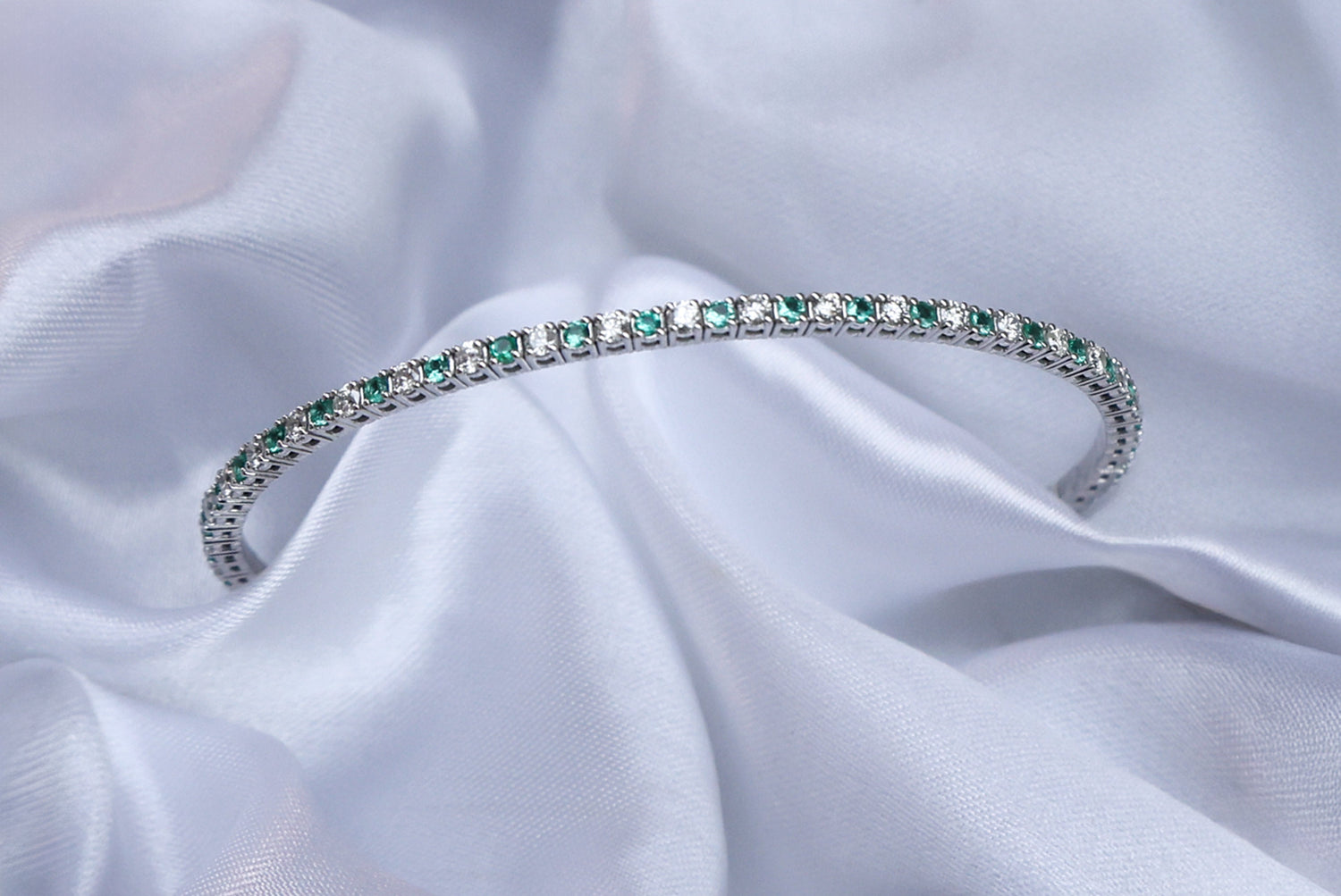 9ct White Gold Emerald & Diamond Tennis Flexible Bangle