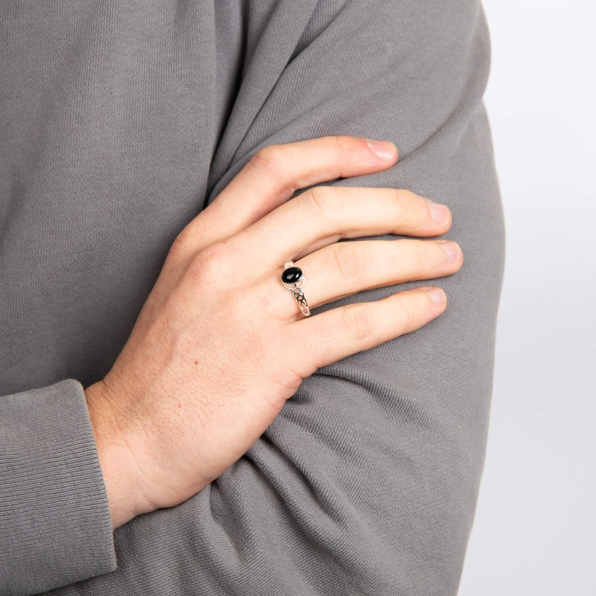 Model wears Sterling Silver Celtic Onyx Signet Ring