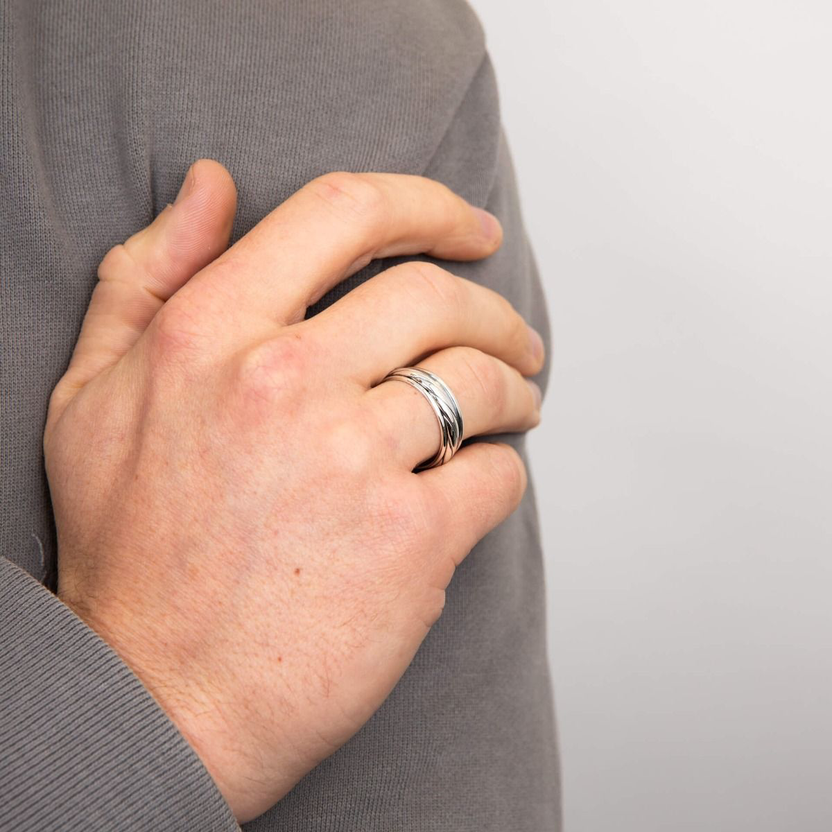 Model wears Sterling Silver Twist Design Spinner Ring