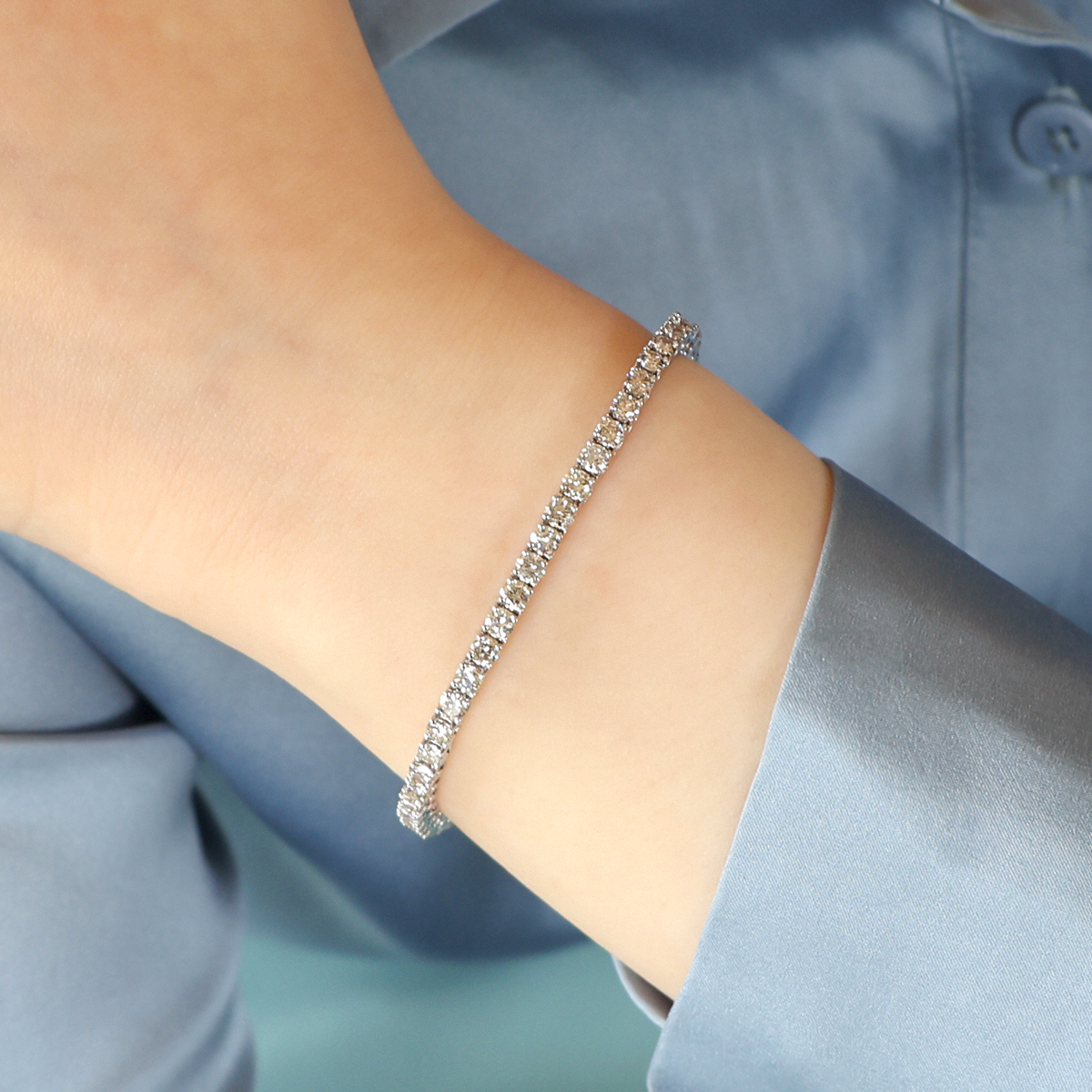Model wears 18ct White Gold 5.00cts Diamond Claw Set Tennis Bracelet