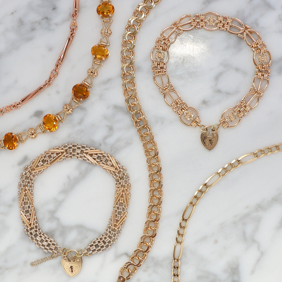 A selection of 9ct and 14ct gold bracelets.