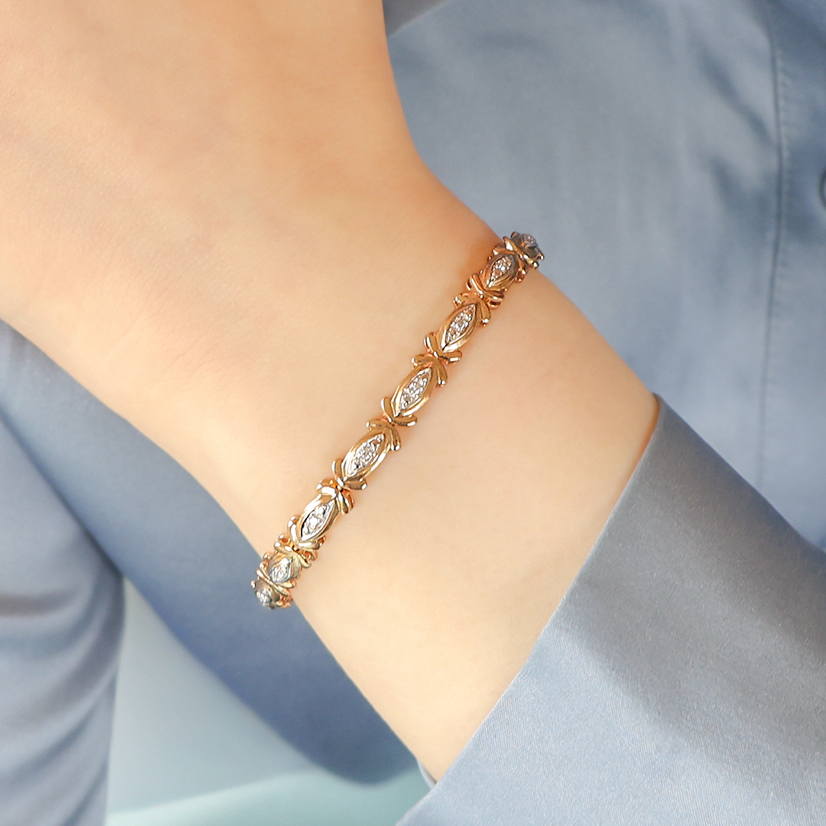 Model wears 9ct Yellow & White Gold Diamond Set Navette Link Bracelet