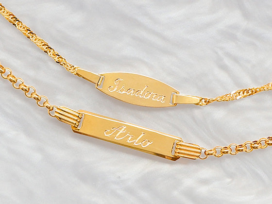 9ct yellow gold children's I.D bracelets personalised with hand-engraved names.