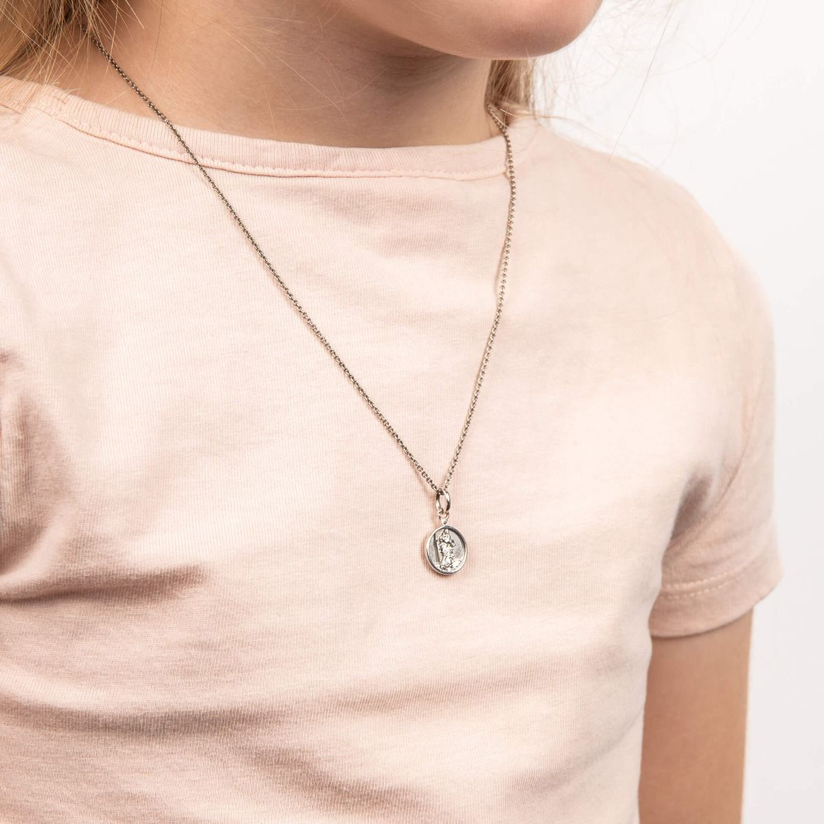 Model wears Recycled Sterling Silver Diamond Saint Christopher Pendant with Chain