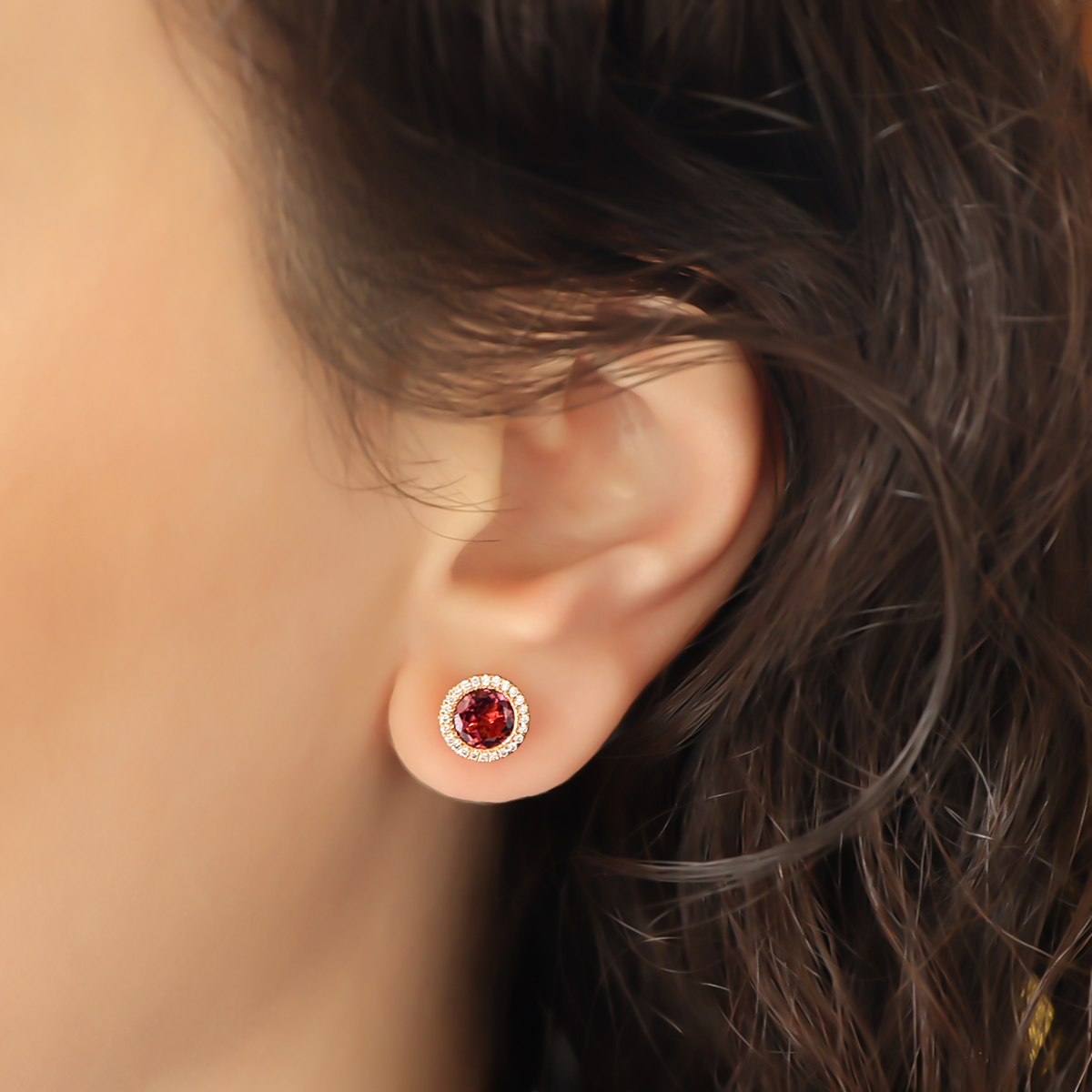 Model wears 18ct Rose Gold Pink Tourmaline & Diamond Halo Stud Earrings