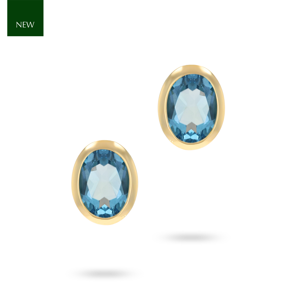 9ct Yellow Gold Oval Shaped Blue Topaz Bezel Set Stud Earrings