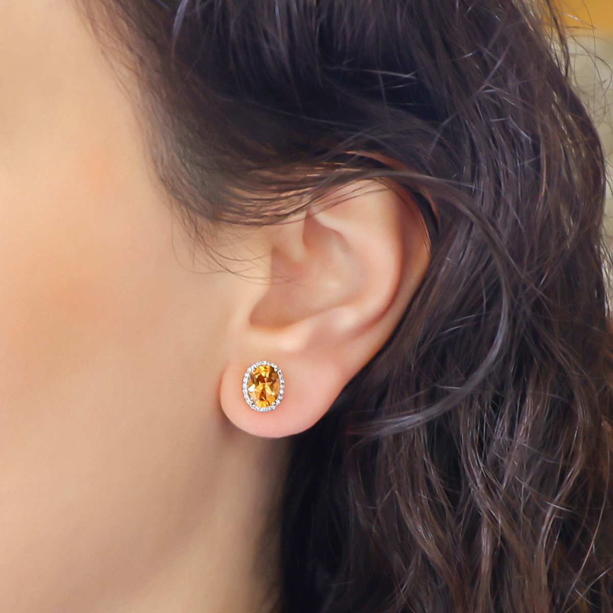 Model wears 9ct Yellow Gold Oval Citrine & Diamond Cluster Stud Earrings