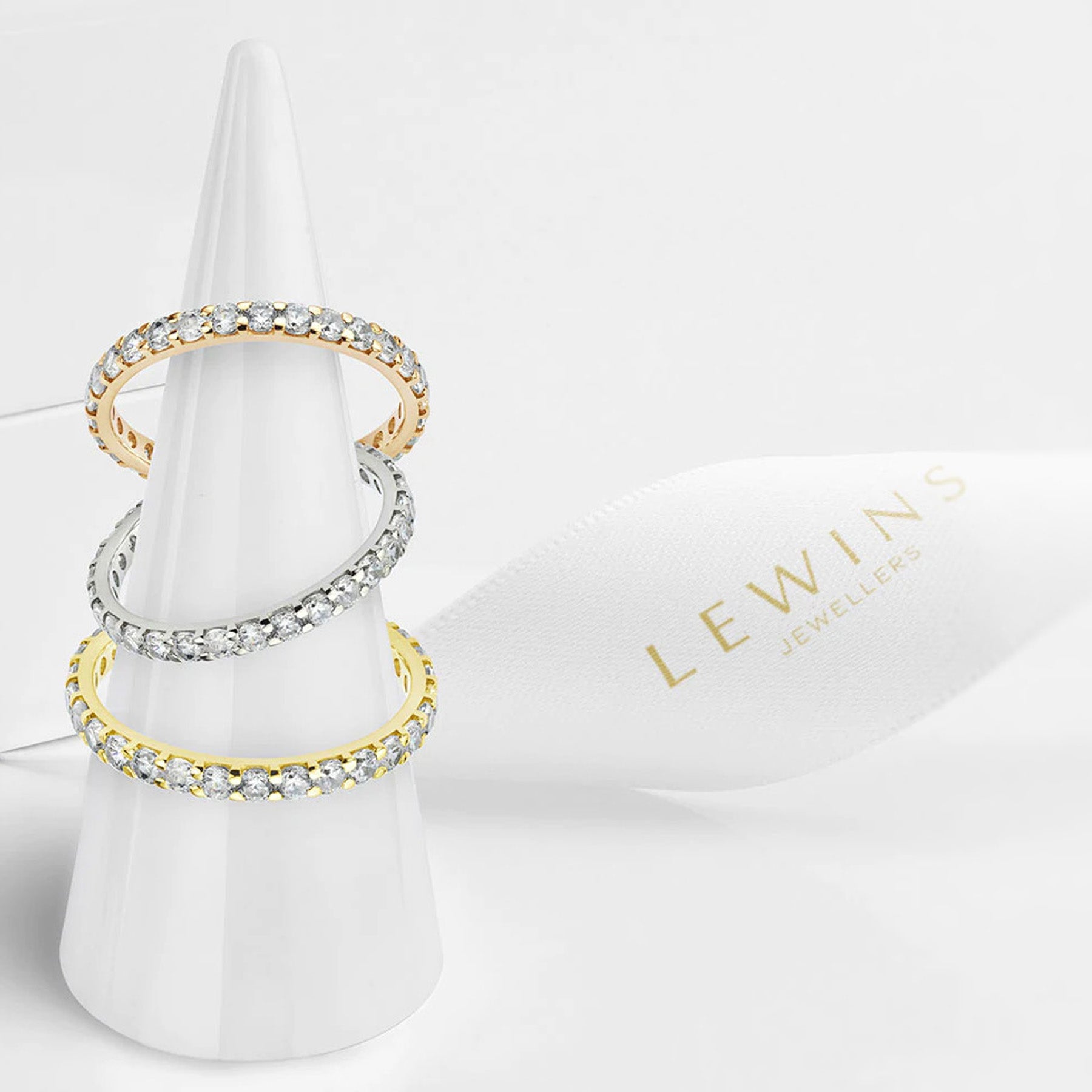 Full eternity rings set with diamonds in yellow, white and rose gold.