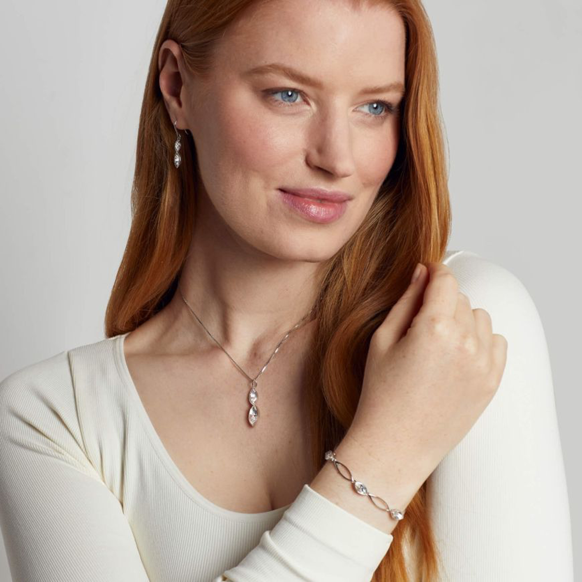Model wears Sterling Silver Crystal Navette Twist Drop Pendant & Chain