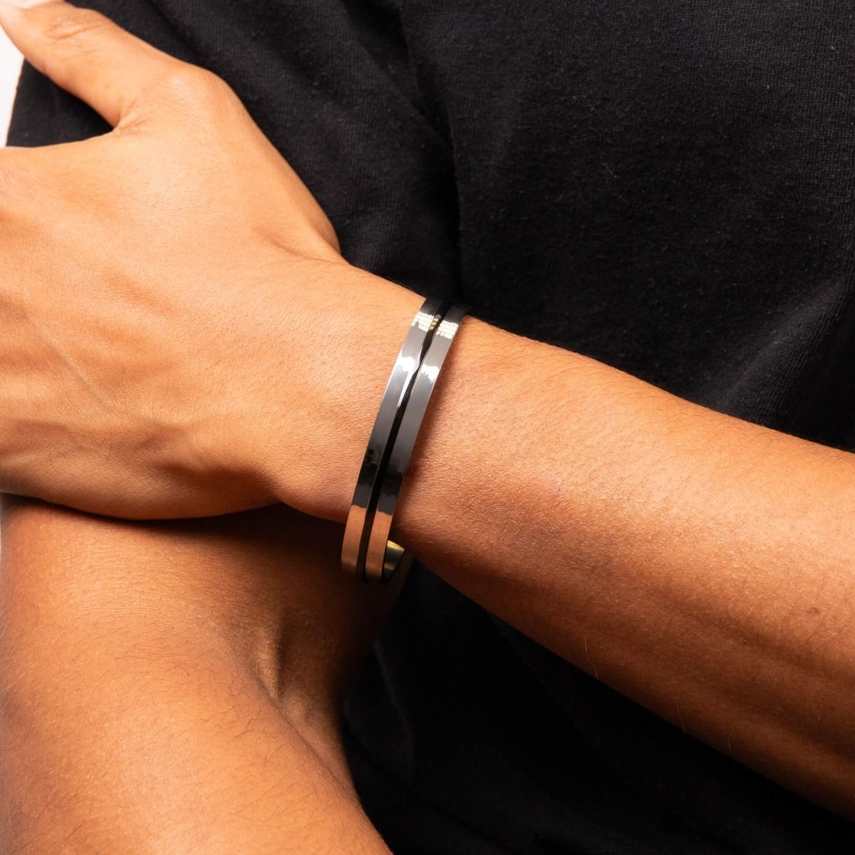 Model wears Stainless Steel Black PVD Stripe Cuff Bangle