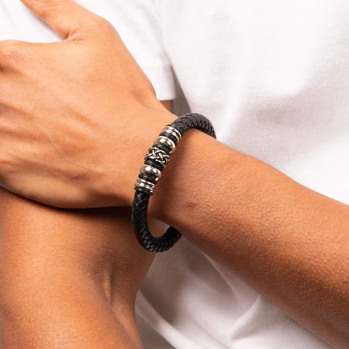 Model wears Stainless Steel Black Leather Celtic Bead Bracelet