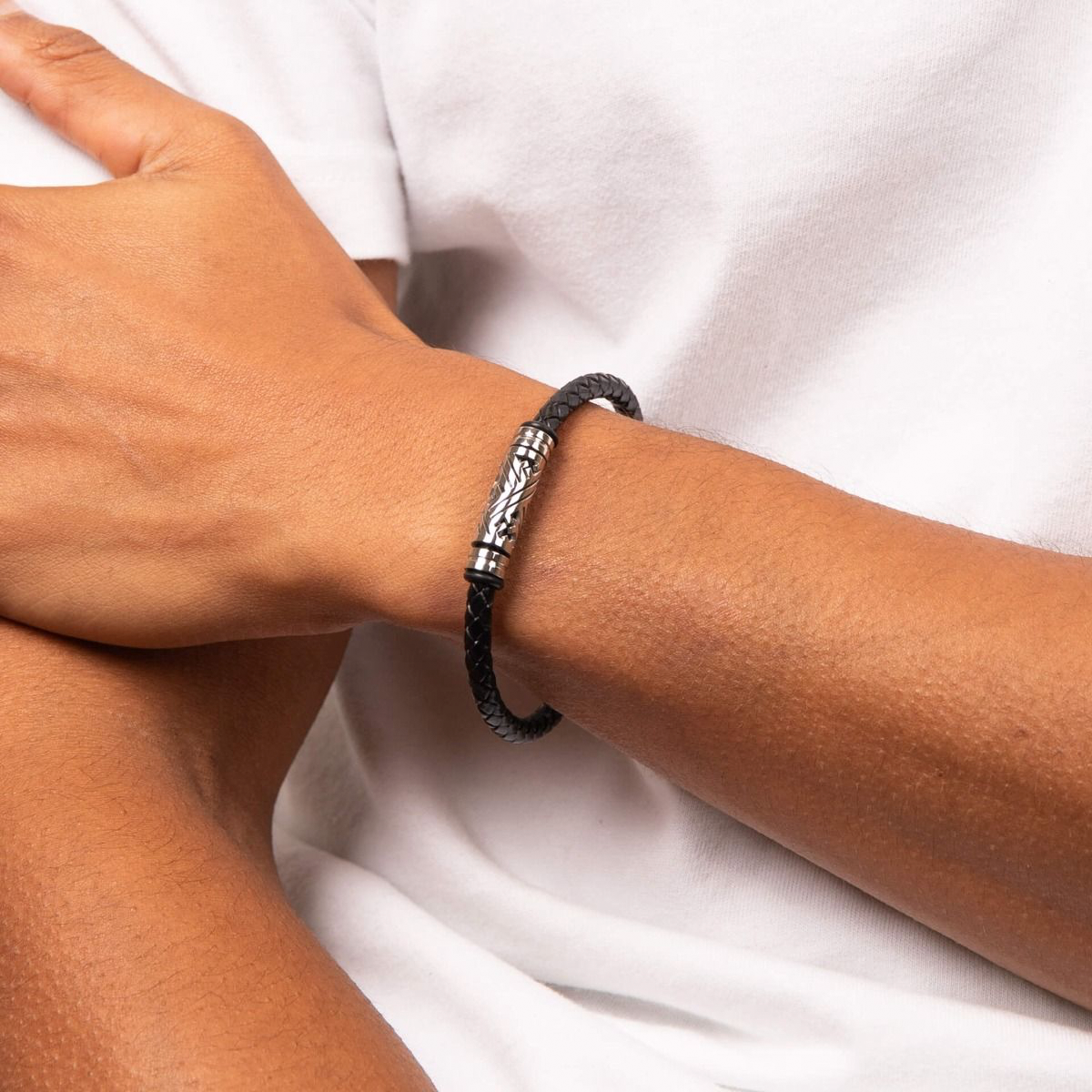 Model wears Stainless Steel Detailed Plaited Black Leather Bracelet