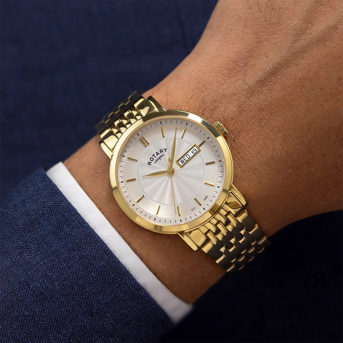 Model wears Rotary Heritage Watch, White Dial with Gold Plated Bracelet GB05423/02