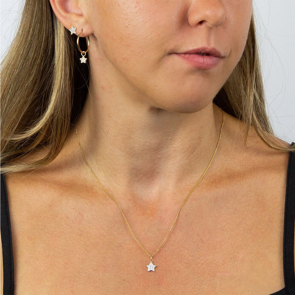 Model wears 9ct Yellow Gold Diamond Set Star Pendant