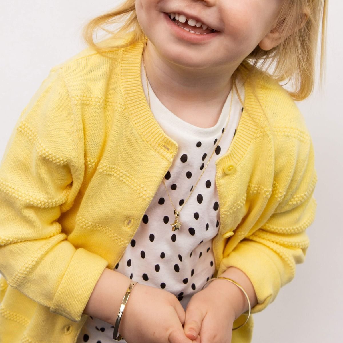 Model wears 9ct Yellow Gold Star Pendant