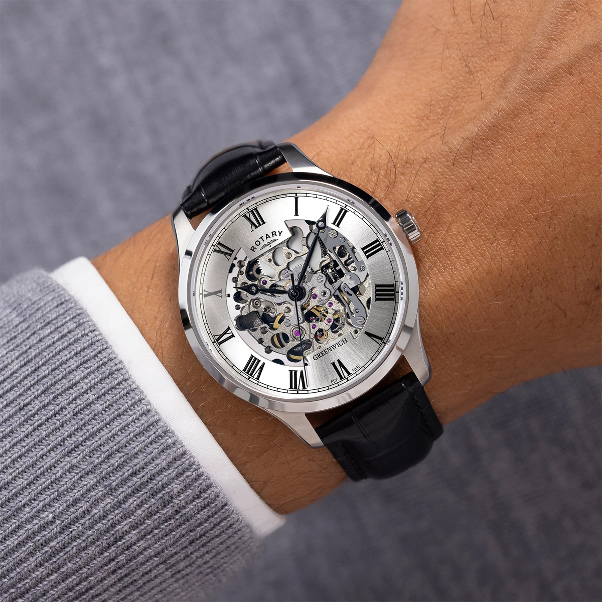 Model wears Rotary Greenwich Skeleton Automatic, Silver Dial with Black Leather Strap - GS02940/06