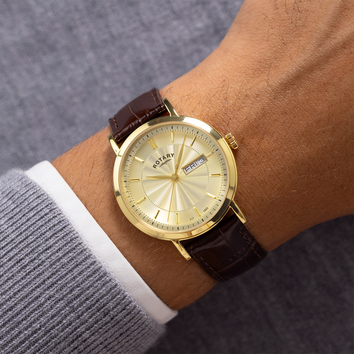 Model wears Rotary Heritage Gold Plated Watch, Champagne Dial with Brown Leather Strap - GS05423/03