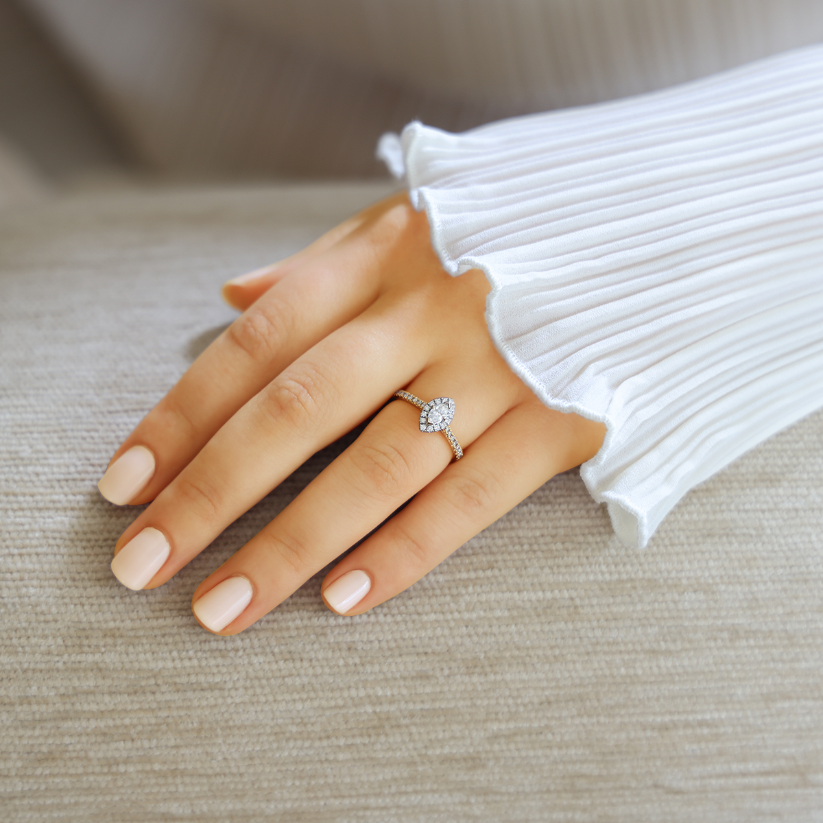 Model wears 18ct Two Colour Gold Marquise Shaped Diamond Halo & Shoulder 0.49ctw Ring