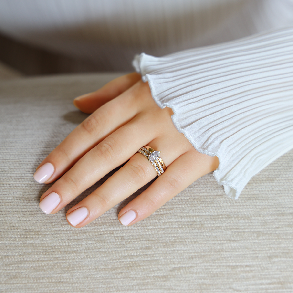 Model wears 18ct Yellow Gold Marquise Cut Diamond Solitaire & Shoulder 1.11ctw Ring with Matching Eternity & Wedding Band