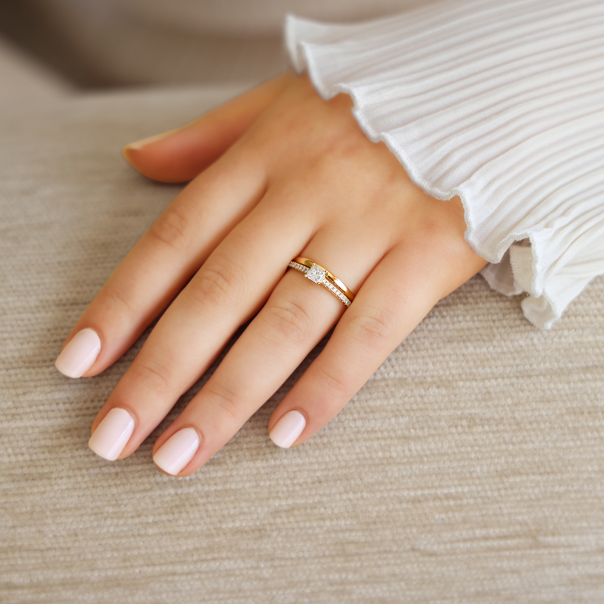 Model wears 18ct Yellow Gold Princess Cut Diamond Solitaire & Shoulder 0.54ctw Ring with Wedding Band