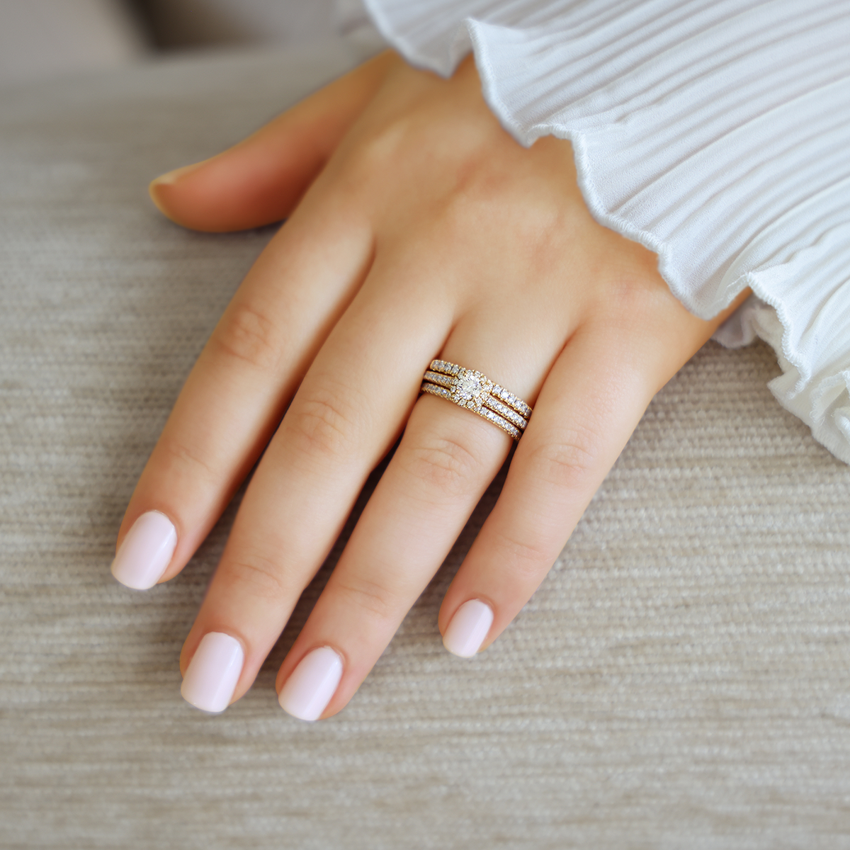 Model wears 18ct Yellow Gold Round Shaped Diamond Halo & Shoulder 0.51ctw Ringwith Matching Eternity & Wedding Band