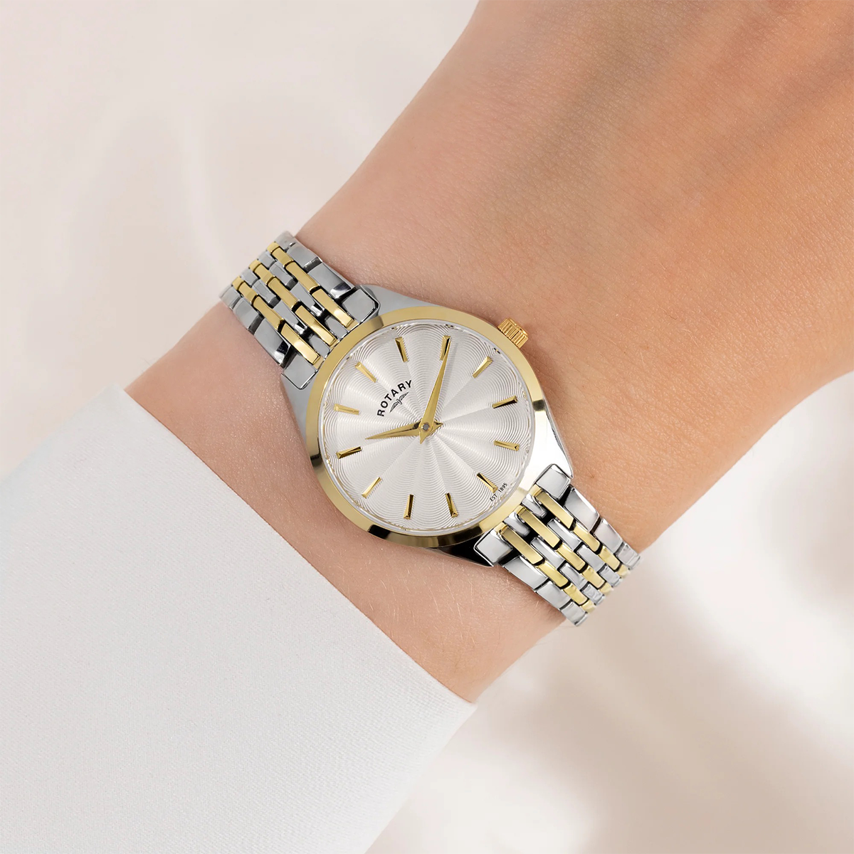 Model wears Rotary Ultra Slim 2-Tone Ladies, Silver Dial with Stainless Steel Bracelet - LB08011/02