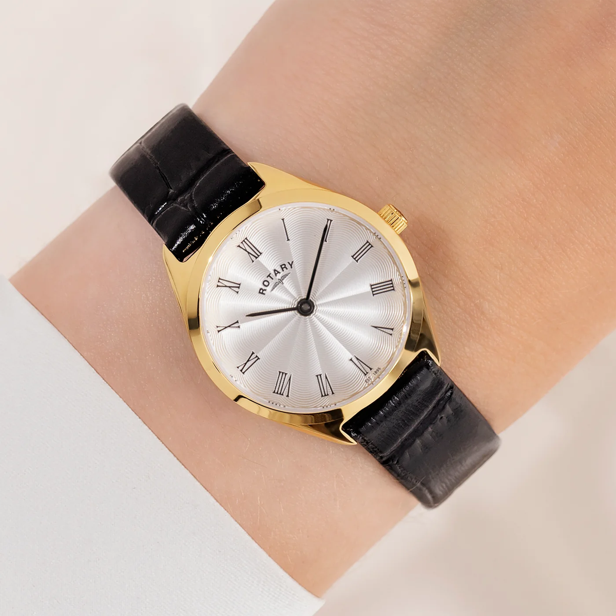 Model wears Rotary Ultra Slim, Silver Dial with Black Leather Strap - LS08013/01