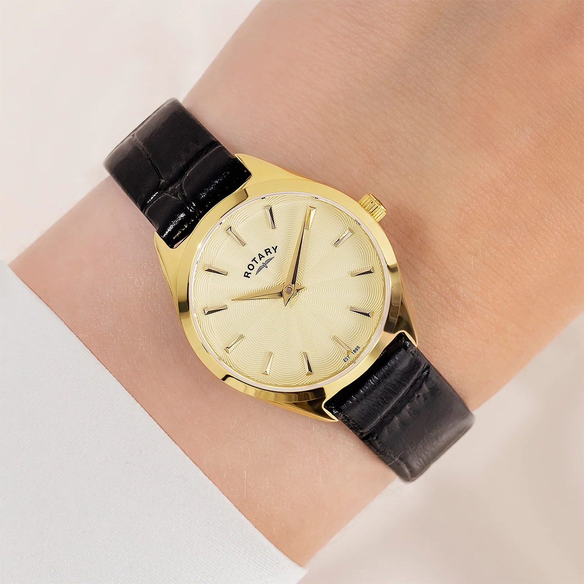 Model wears Rotary Ultra Slim, Gold Dial with Black Leather Strap - LS08013/03
