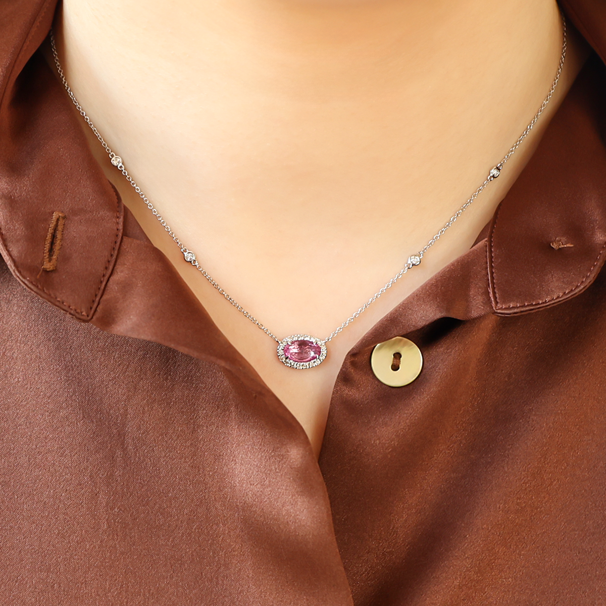 Model wears 18ct White Gold Rose Cut Pink Sapphire & Diamond Halo Necklace