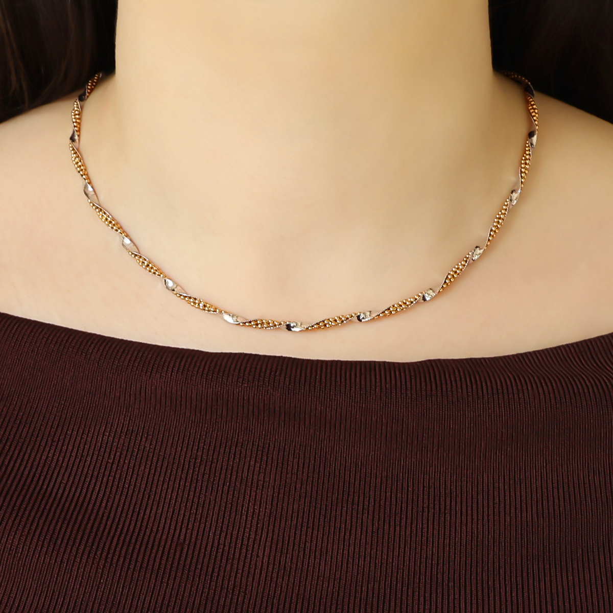 Model wears 18ct Yellow & White Gold Herringbone & Beaded Twist Link Necklace