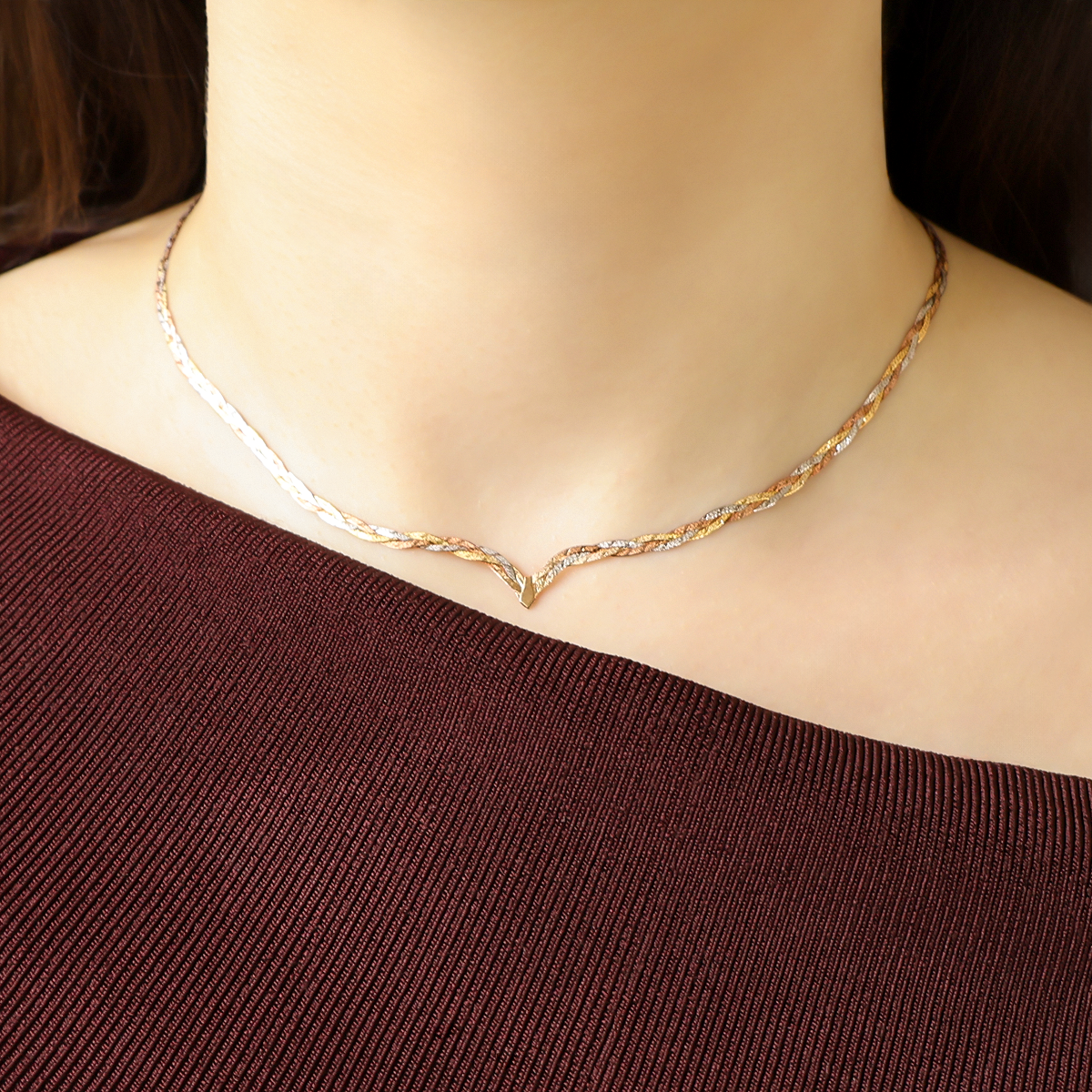 Model wears 9ct Three Colour Gold V-Shape Plait Herringbone Collarette Necklace