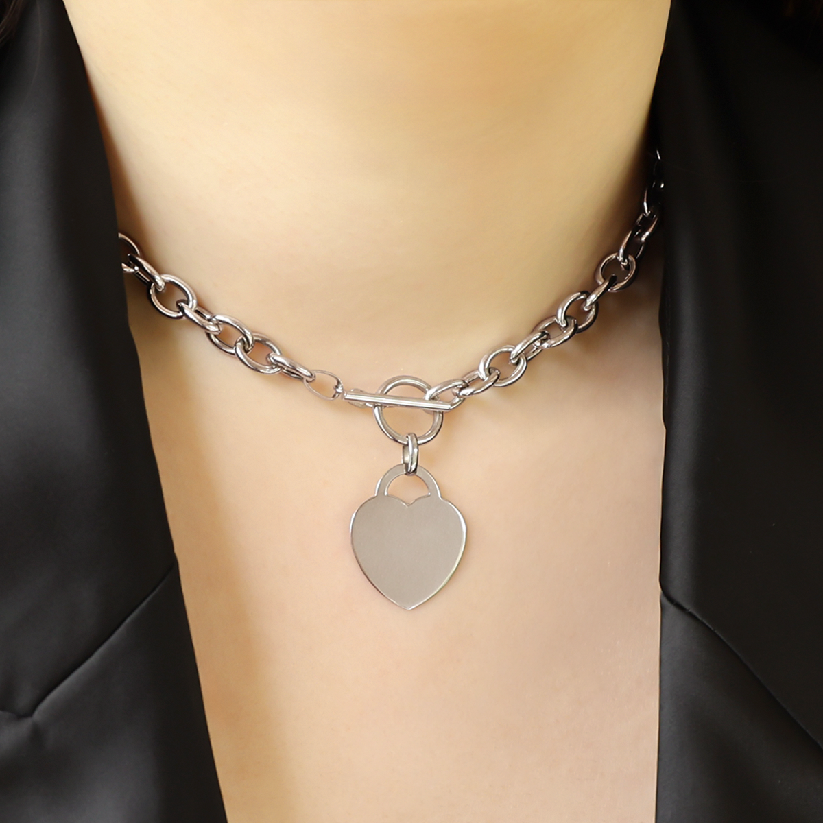 Model wears 9ct White Gold 15” Oval Belcher Heart Tag T-Bar Necklace