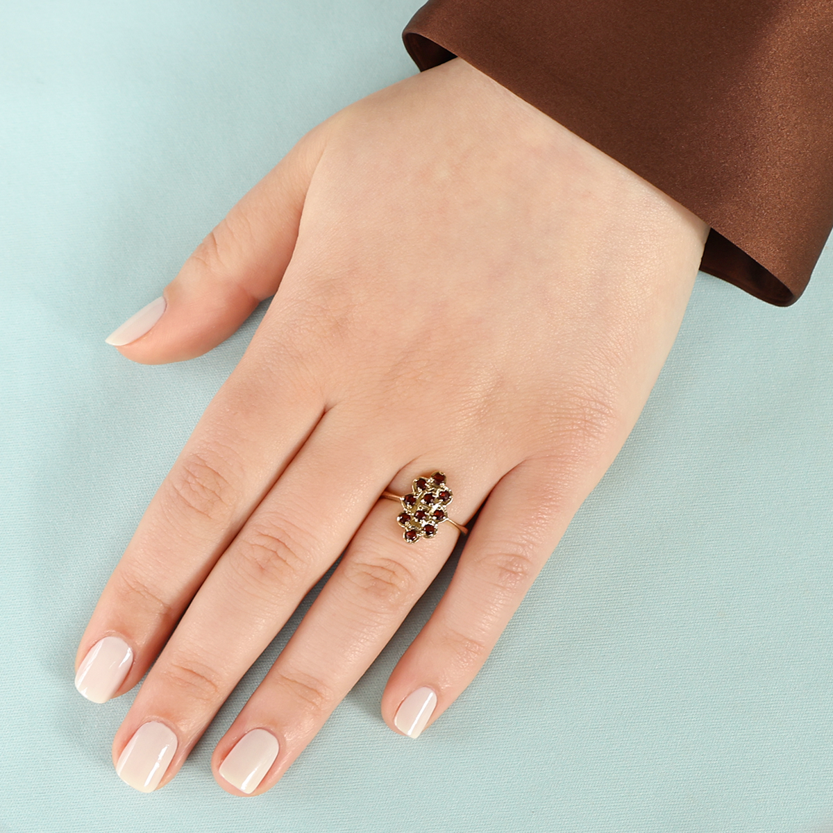 Model wears 9ct Yellow Gold Garnet Set Tablet Ring