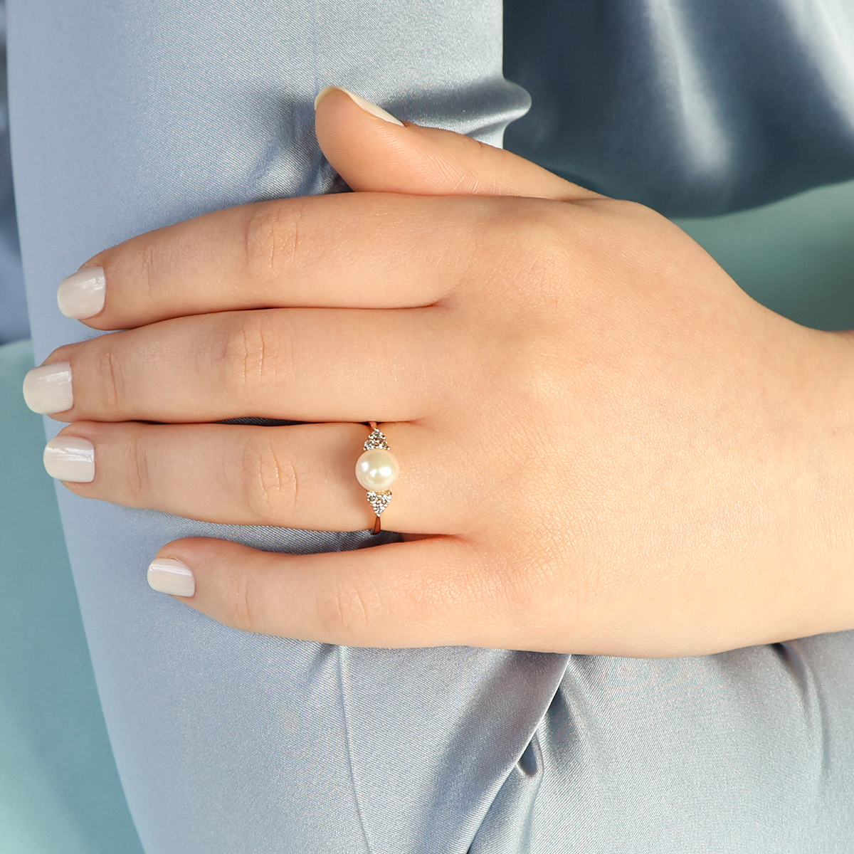 Model wears 9ct Yellow Gold Cultured Pearl & Diamond Trefoil Ring