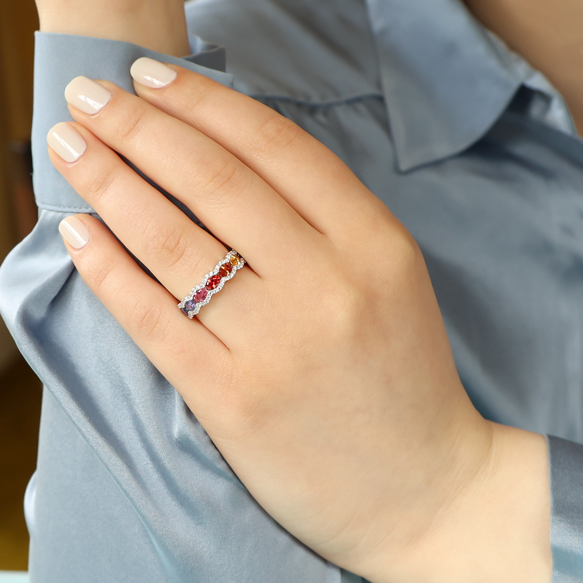 Model wears 18ct White Gold Fancy Sapphire & Diamond Scalloped Eternity Ring