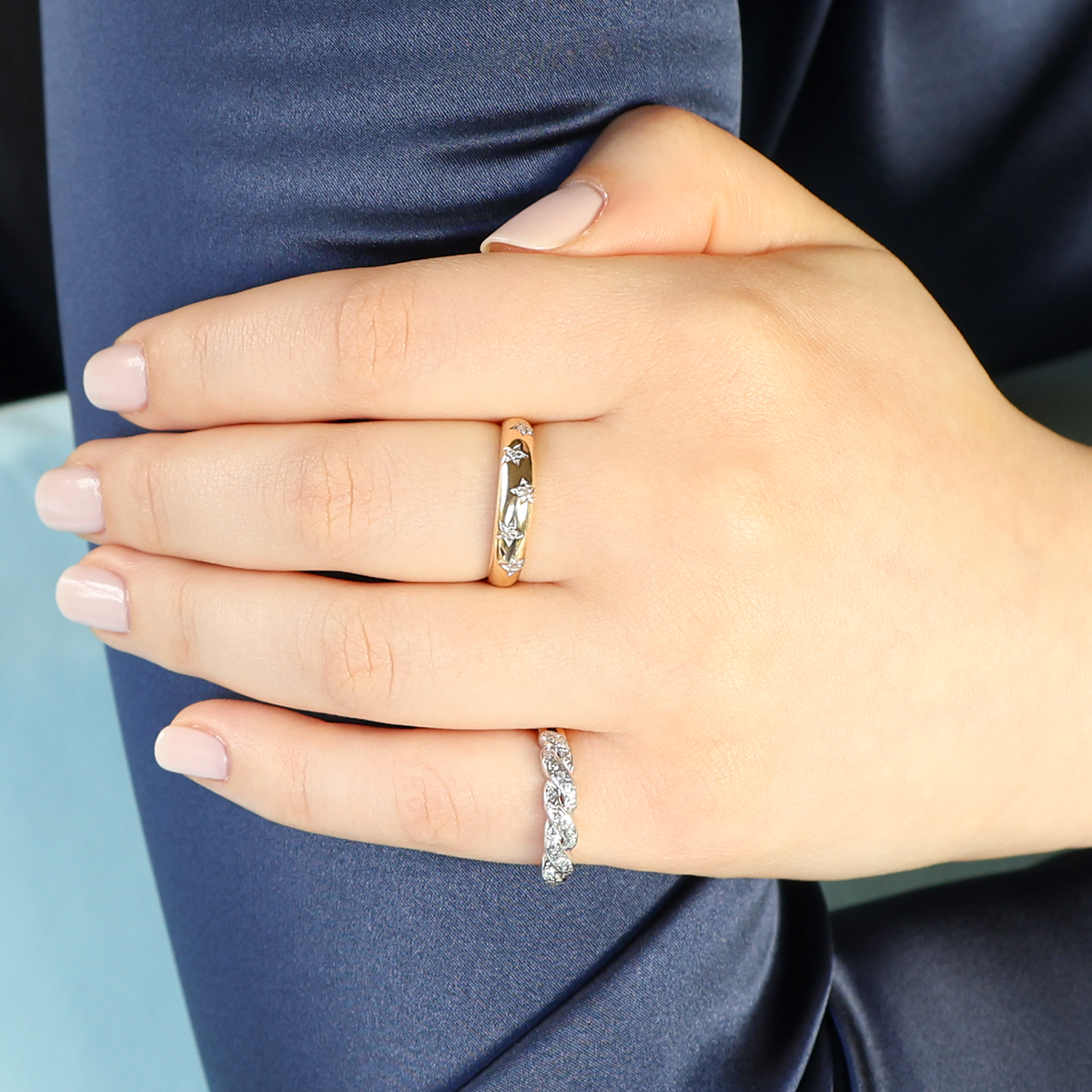 Model wears 9ct Yellow Gold Star Set Diamond Ring & 18ct Yellow Gold Diamond Set Plait Ring