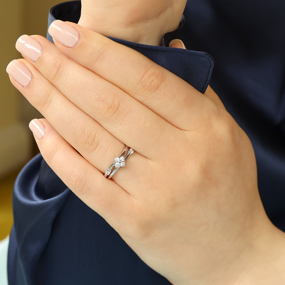 Model wears 9ct White Gold Double Wave 0.17ctw Diamond Ring