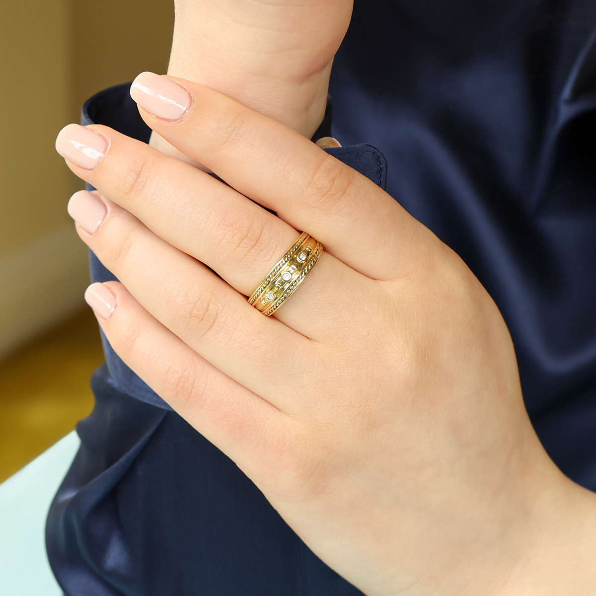 Model wears 9ct Yellow Gold Diamond Set Twist Edge Ring