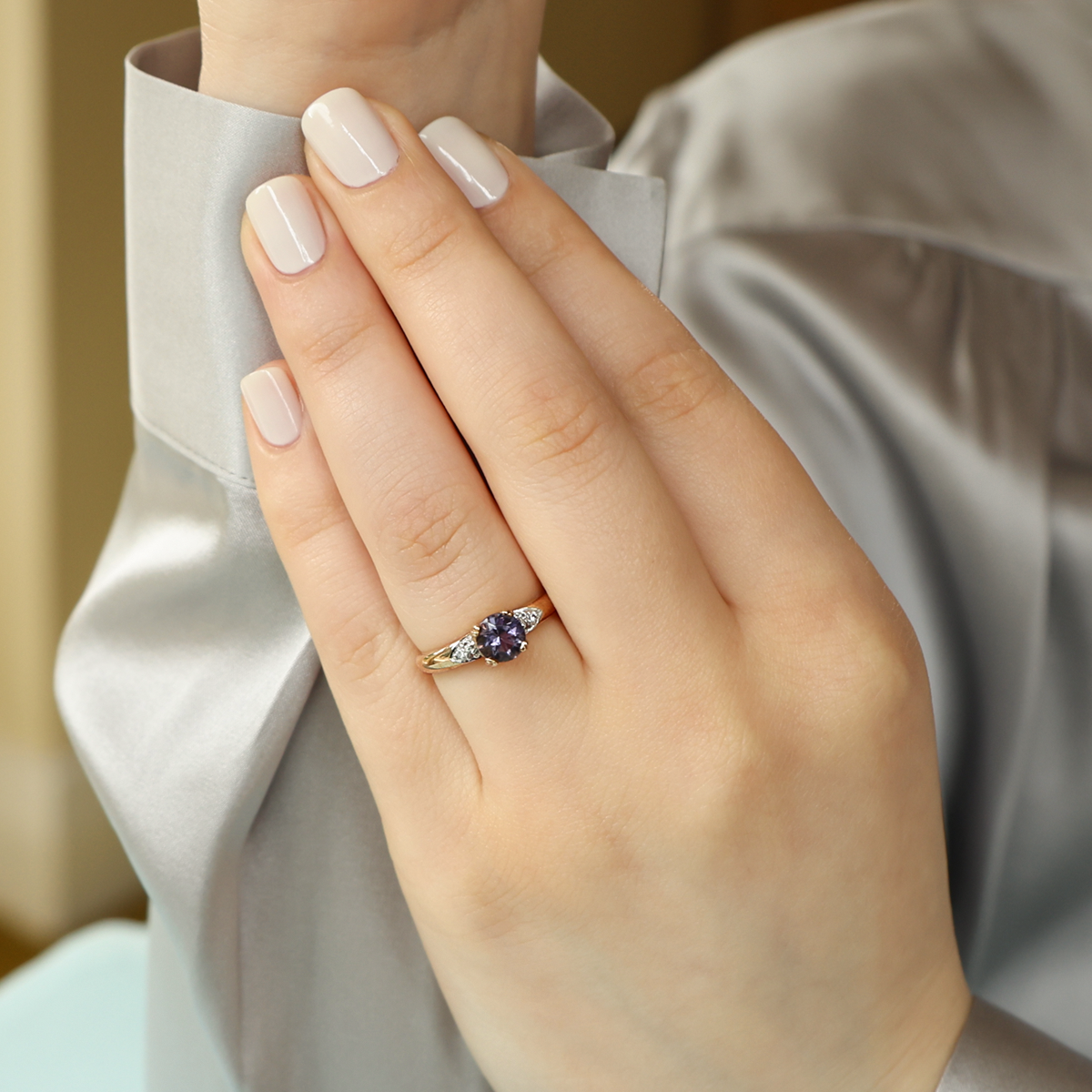 Model wears 9ct Yellow Gold Iolite & White Topaz Solitaire Ring