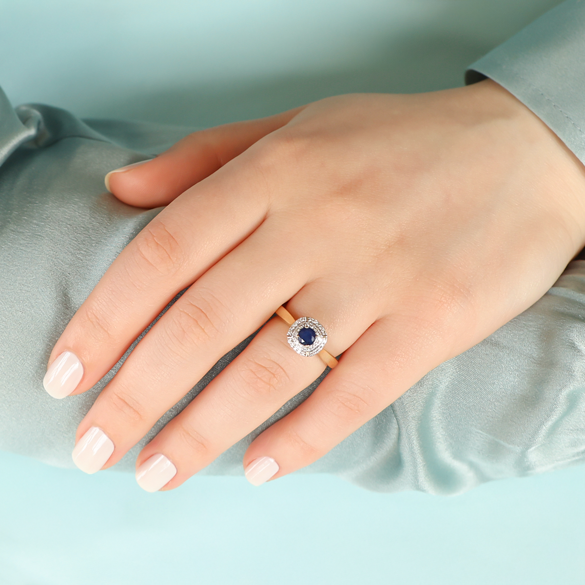 Model wears 9ct Yellow Gold Sapphire & Diamond Double Halo Ring