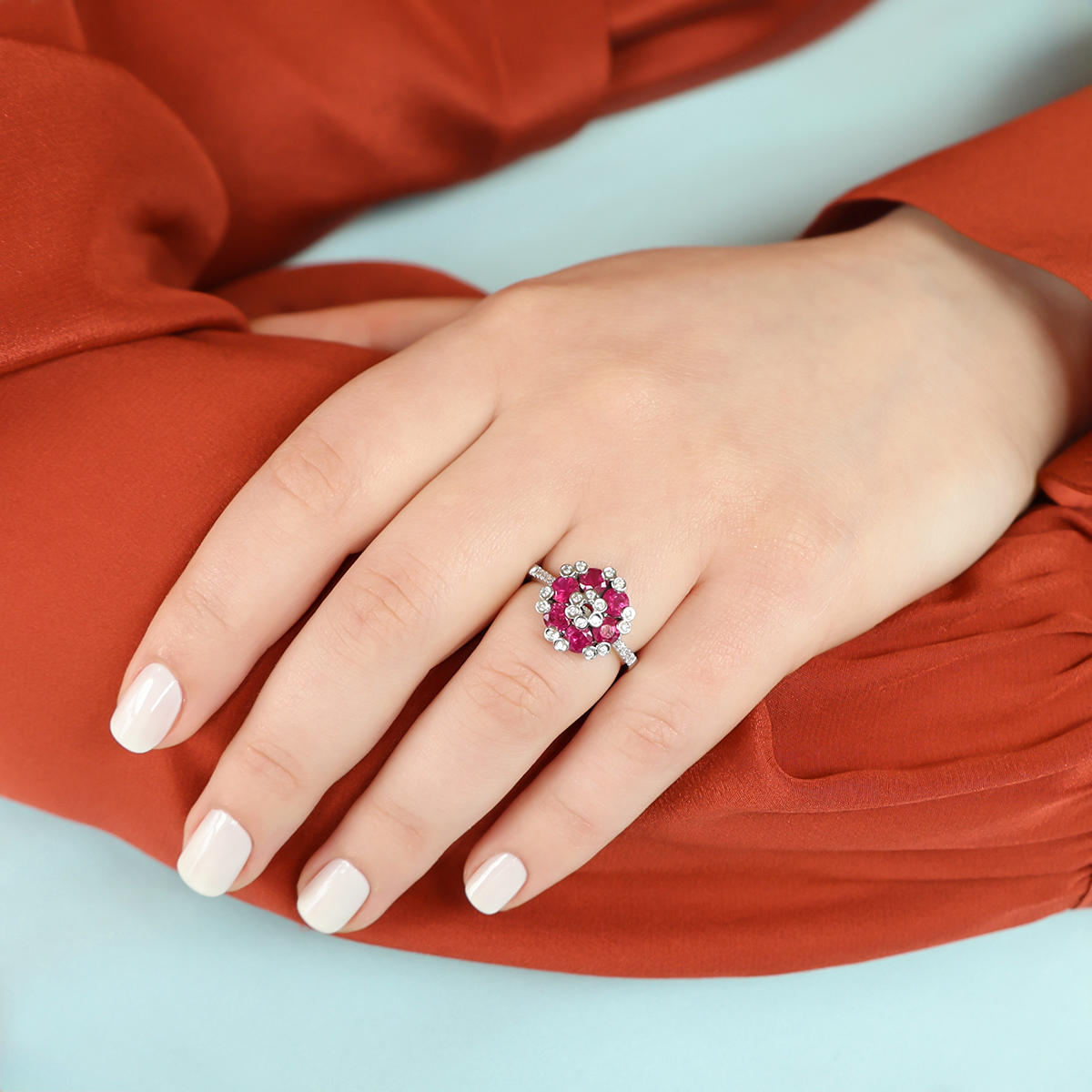 Model wears 18ct White Gold Ruby & Diamond Cluster With Diamond Set Shoulders Ring