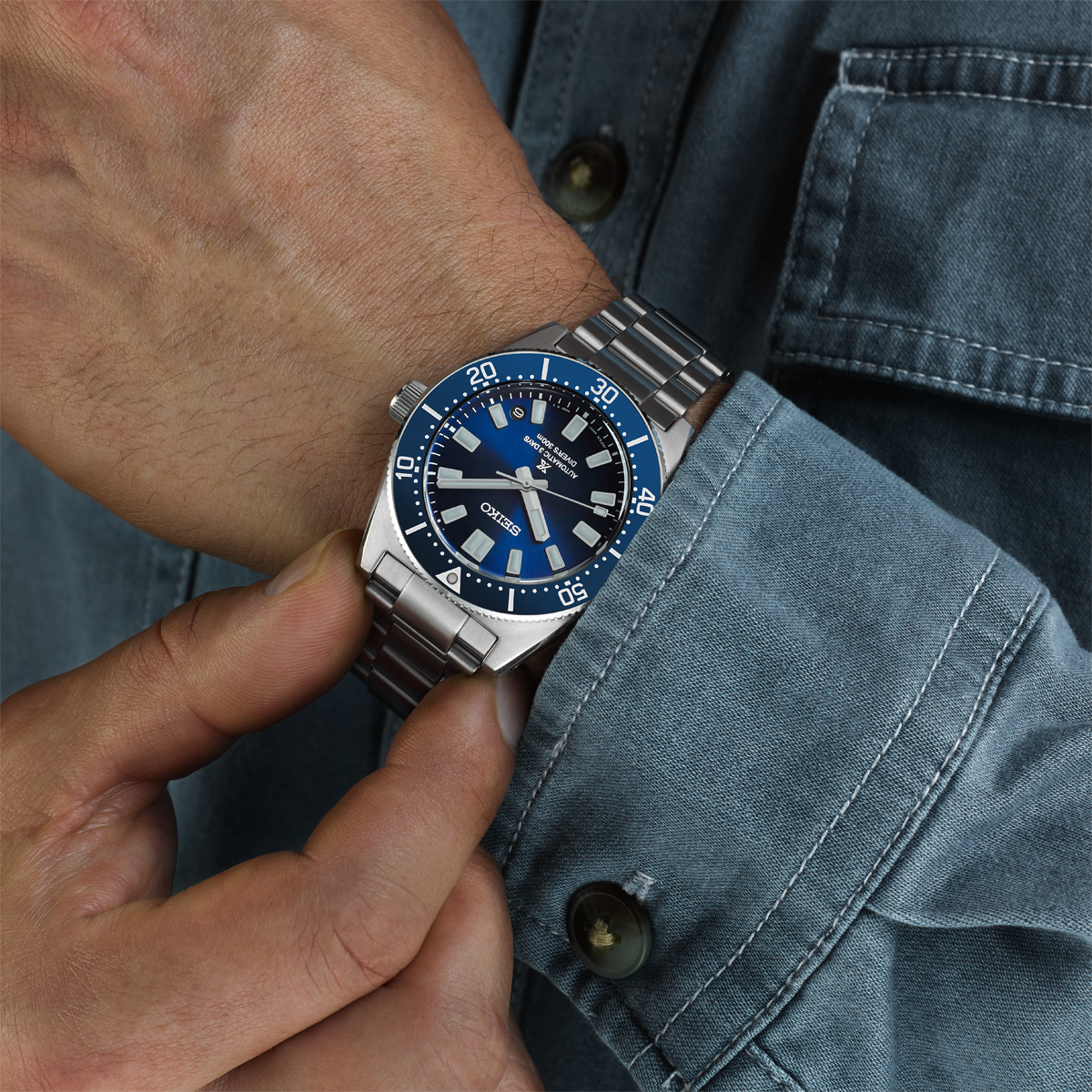 Model wears Seiko Prospex 1965 Heritage Diver’s Revival 3-day 300m In Scuba Blue - SPB451J1