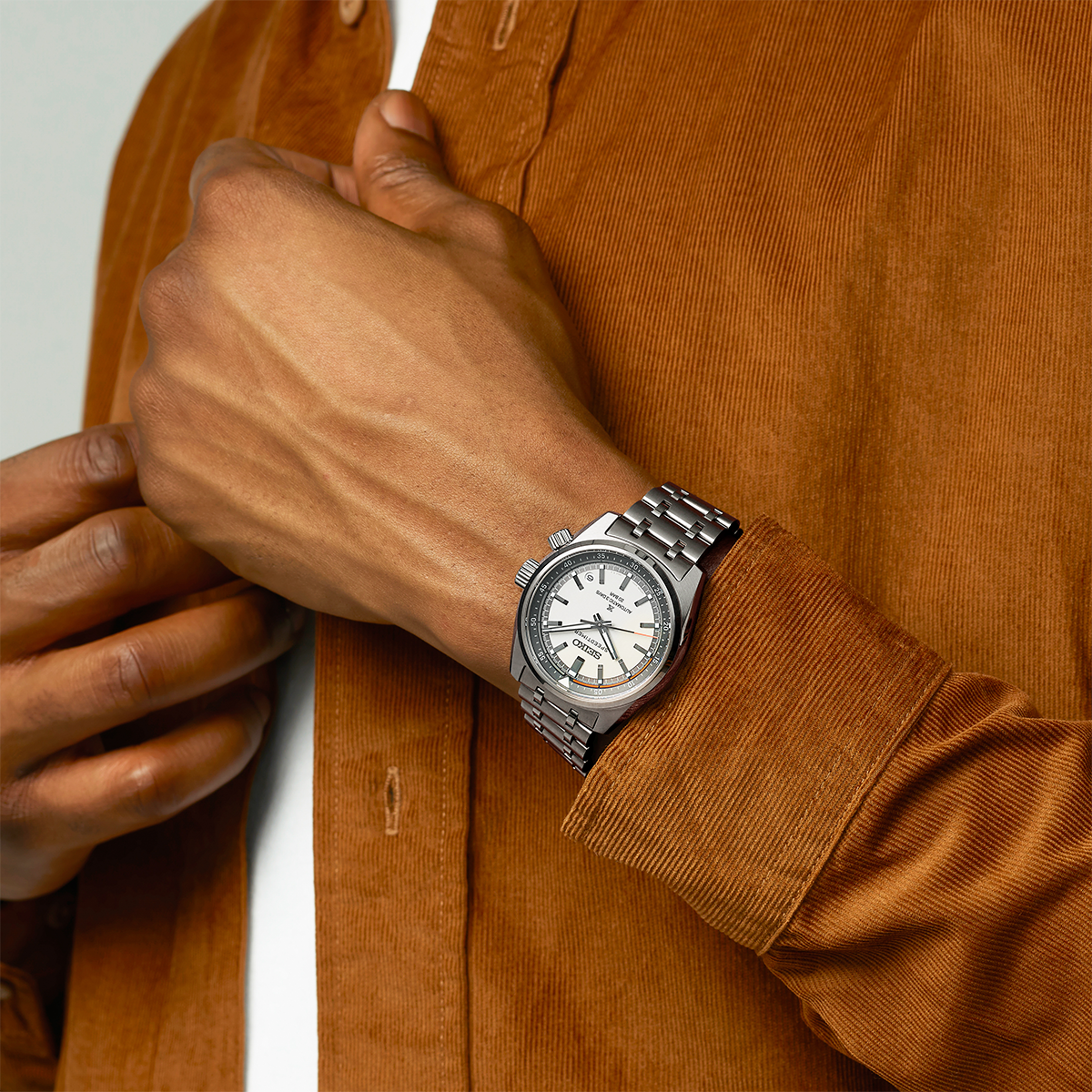 Model wears Seiko Prospex Speedtimer 6R ‘Compact Countdown’ In Grey-White Contrast - SPB513J1