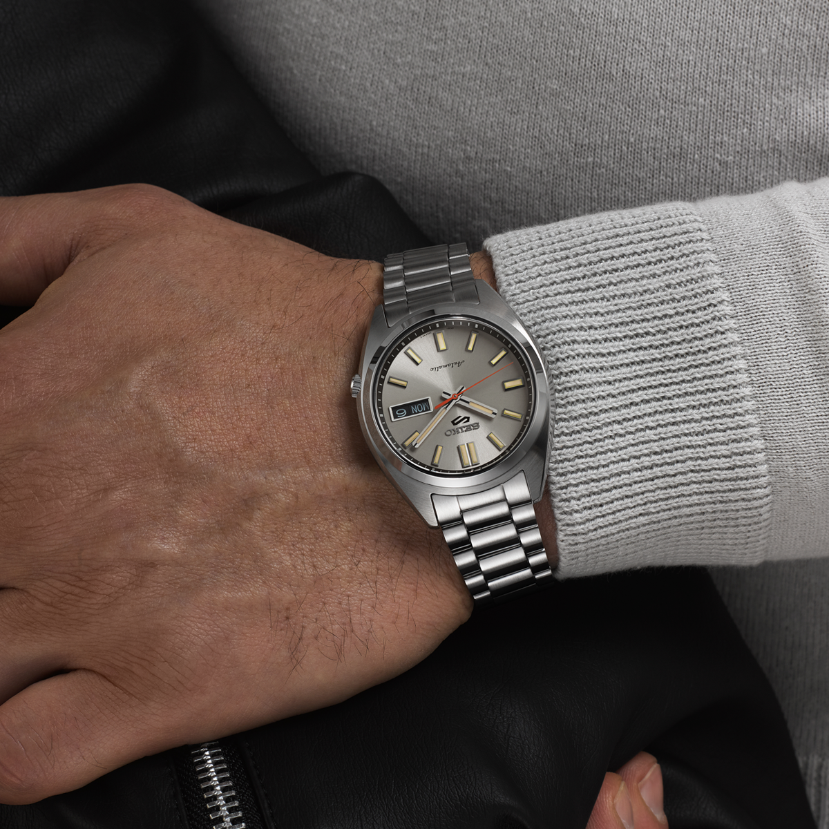 Model wears Seiko 5 Sports SNXS 'Beige Chinos' Classic Sports - SRPK91K1