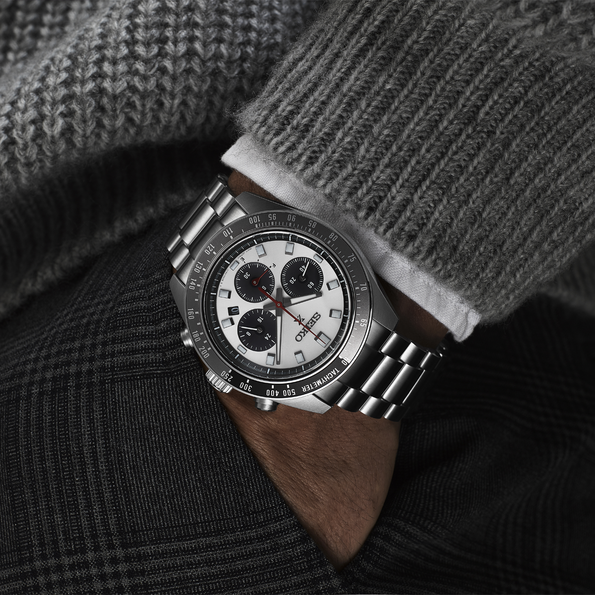 Model wears Seiko Prospex Speedtimer “Go Large” Solar Chronograph, White Dial With Stainless Steel Bracelet - SSC911P1