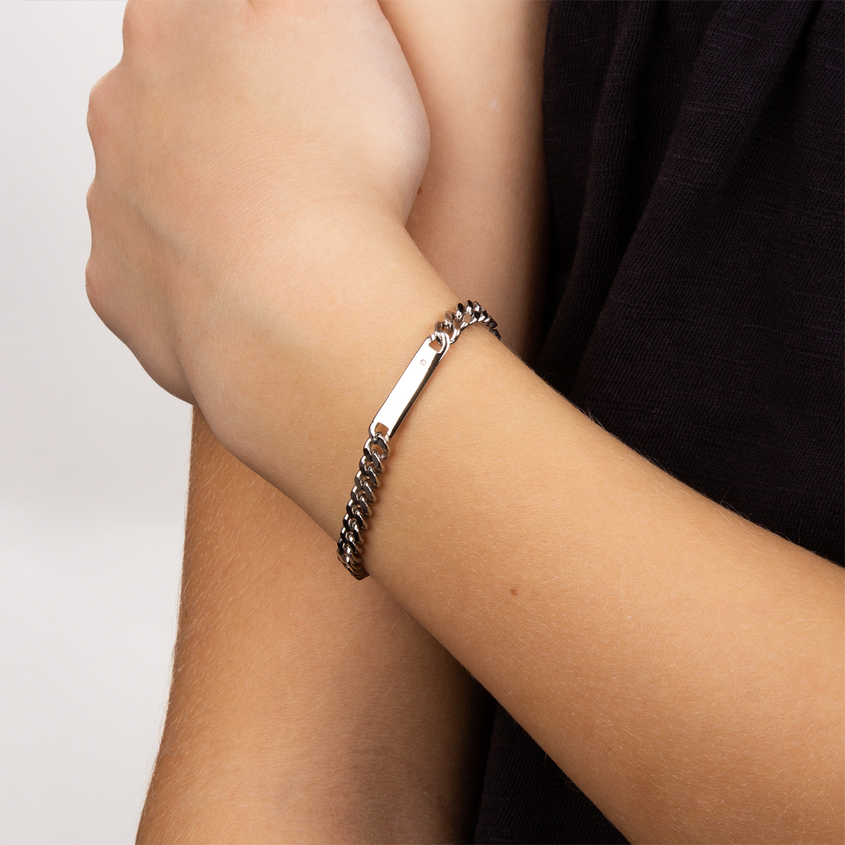 Model wears Sterling Silver Plain Engravable ID Bar Bracelet With Diamond