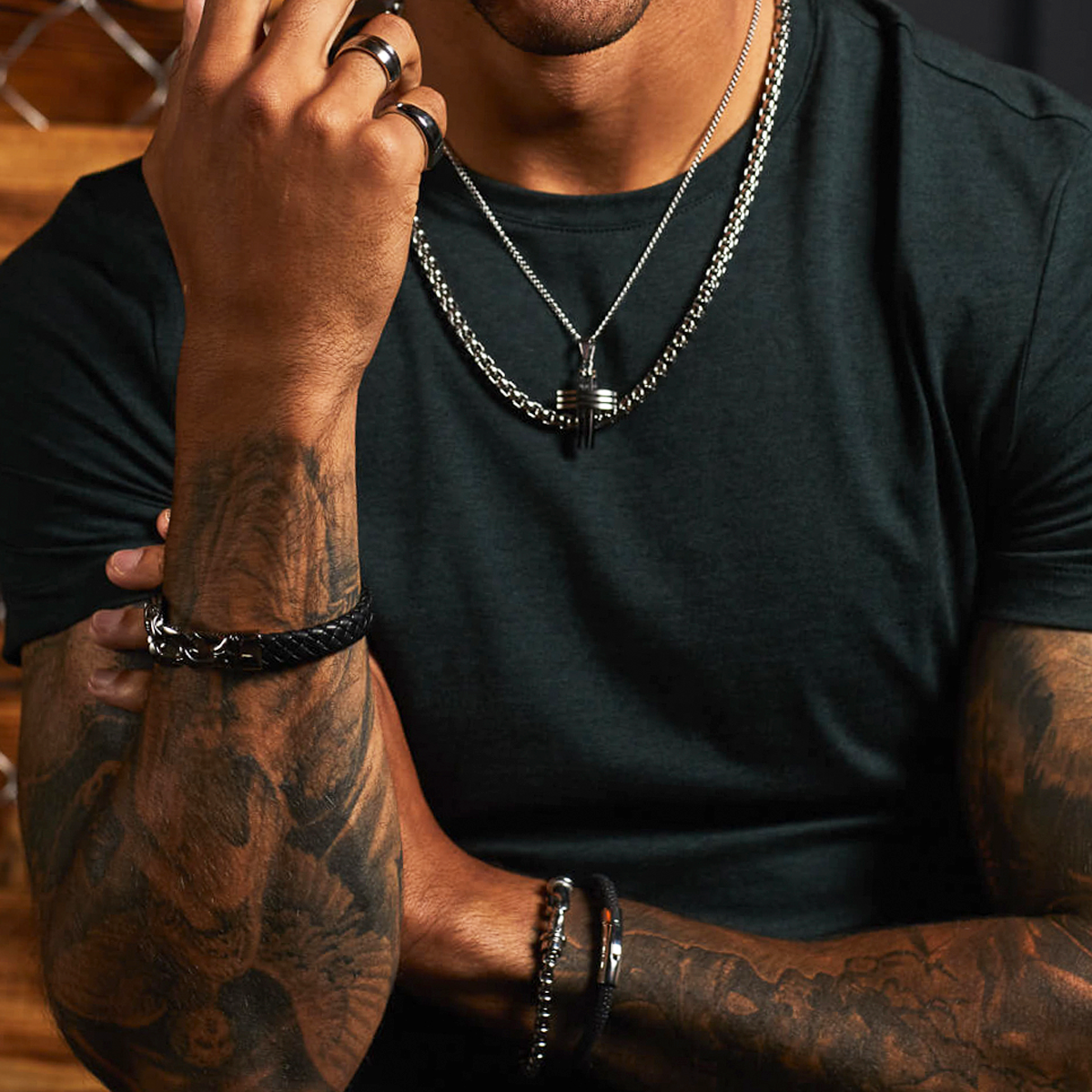 Model wears Stainless Steel Triple Cross Pendant