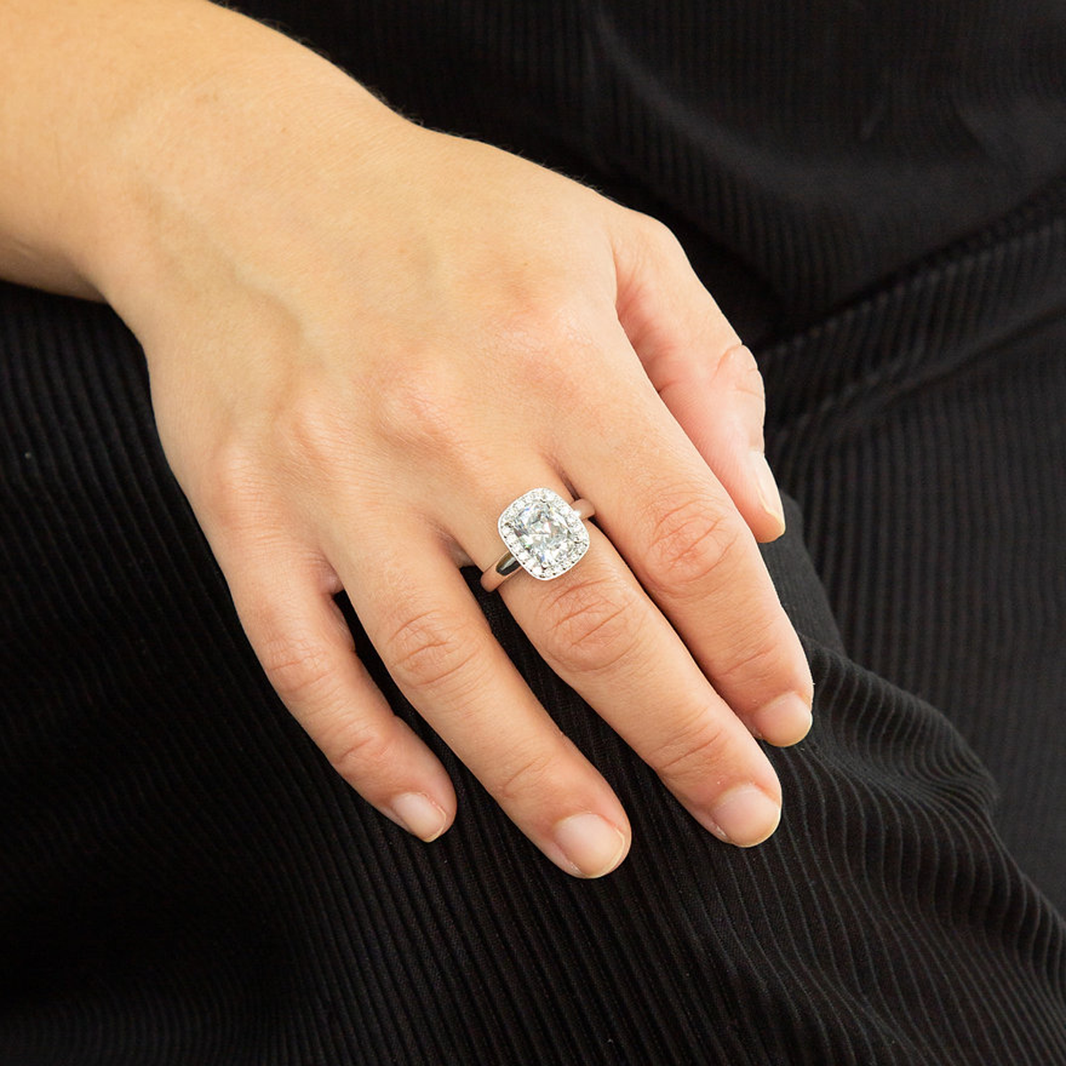 Model hand wearing Sterling Silver Cushion Cut Cubic Zirconia Cocktail Ring