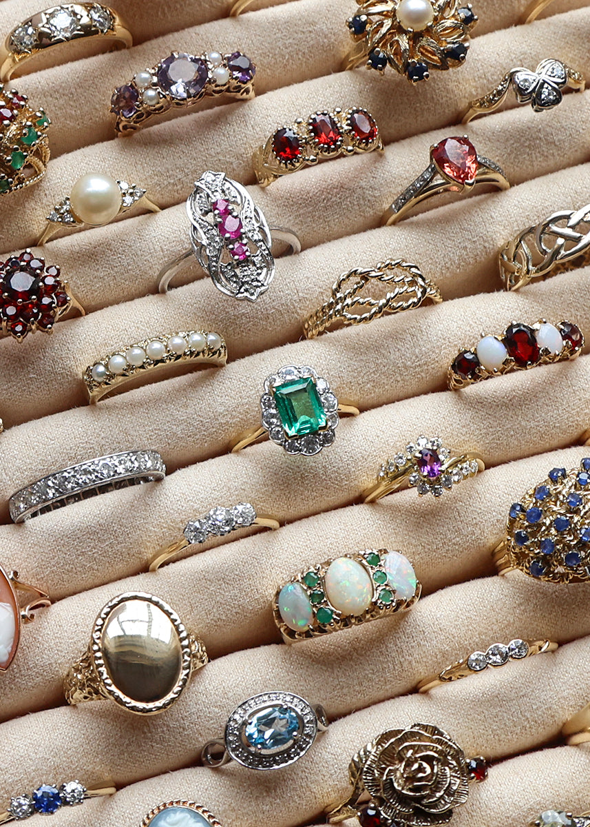 Selection of Antique, Vintage & Estate rings crafted within gold or platinum and set with gemstones or detailed with intricate motifs. 