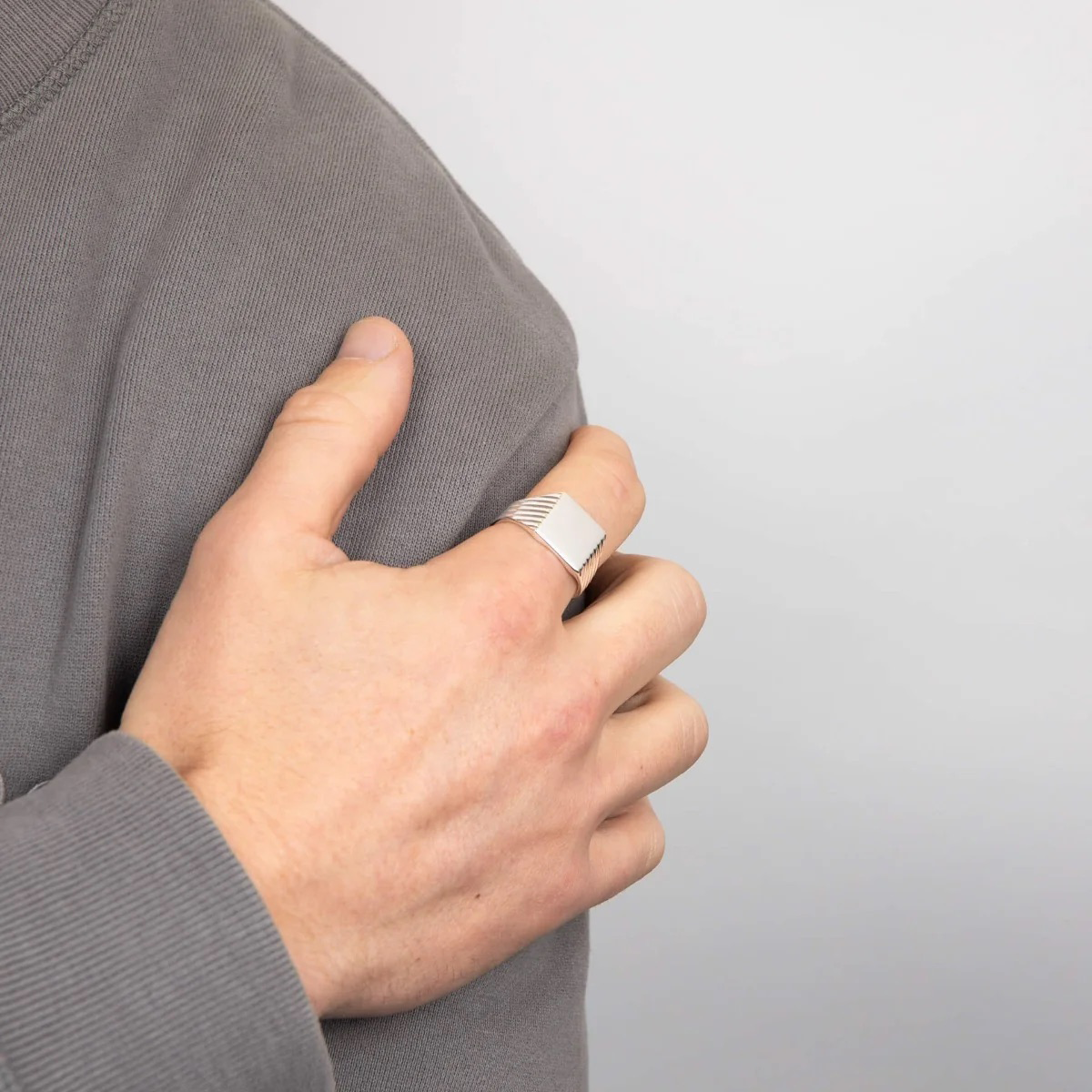 Model wears Sterling Silver Square Signet Ring with Ridged Sides